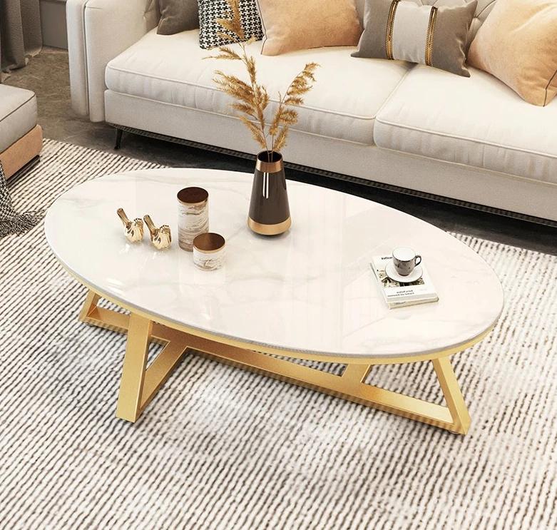 Serina Oval Sintered Stone top Coffee Table/ Golden coloured legs/steel frame